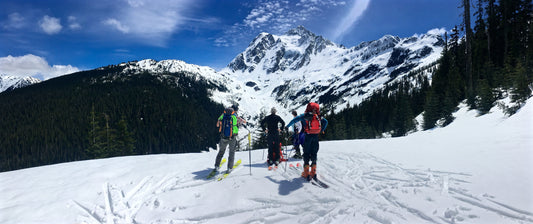 Skiers look at Mount Shuksans Hanging Glacier and White Salmon Glaciers 