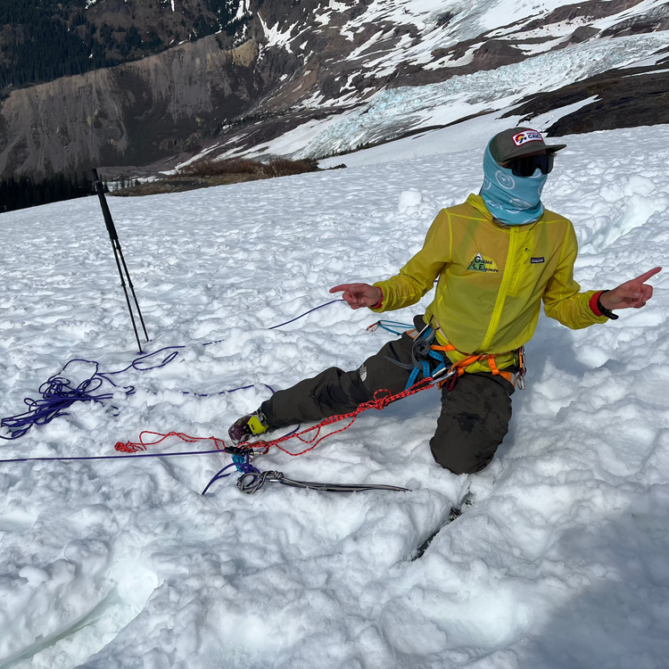 AMGA Splitboard guide Sarah Macgregor teaches snow anchors and crevasse rescue during washingtons only womens splitboard mountaineering course