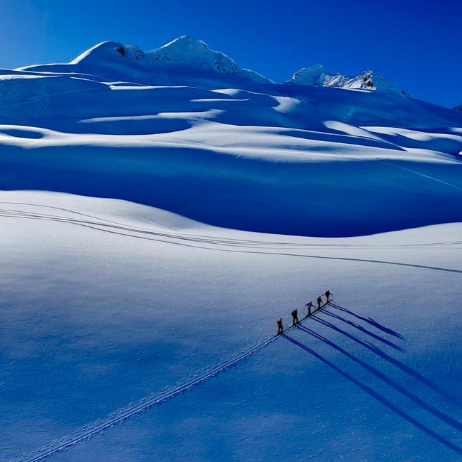 Skier touring big-mountain terrain near Thompson Pass, Valdez, Alaska