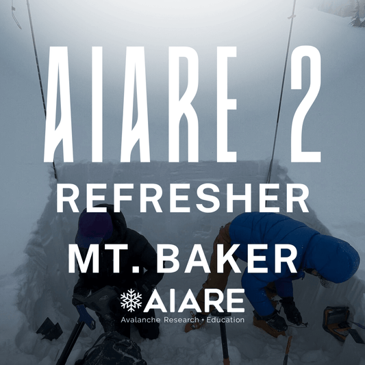 Two people in winter gear with equipment on a snowy mountain, featuring AIARE branding.