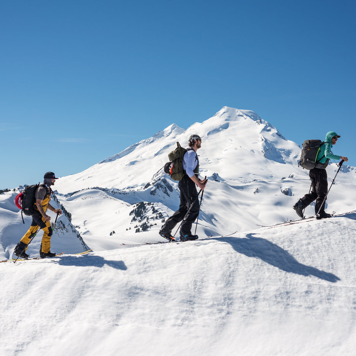Splitboarder riding powder in the Mount Baker backcountry