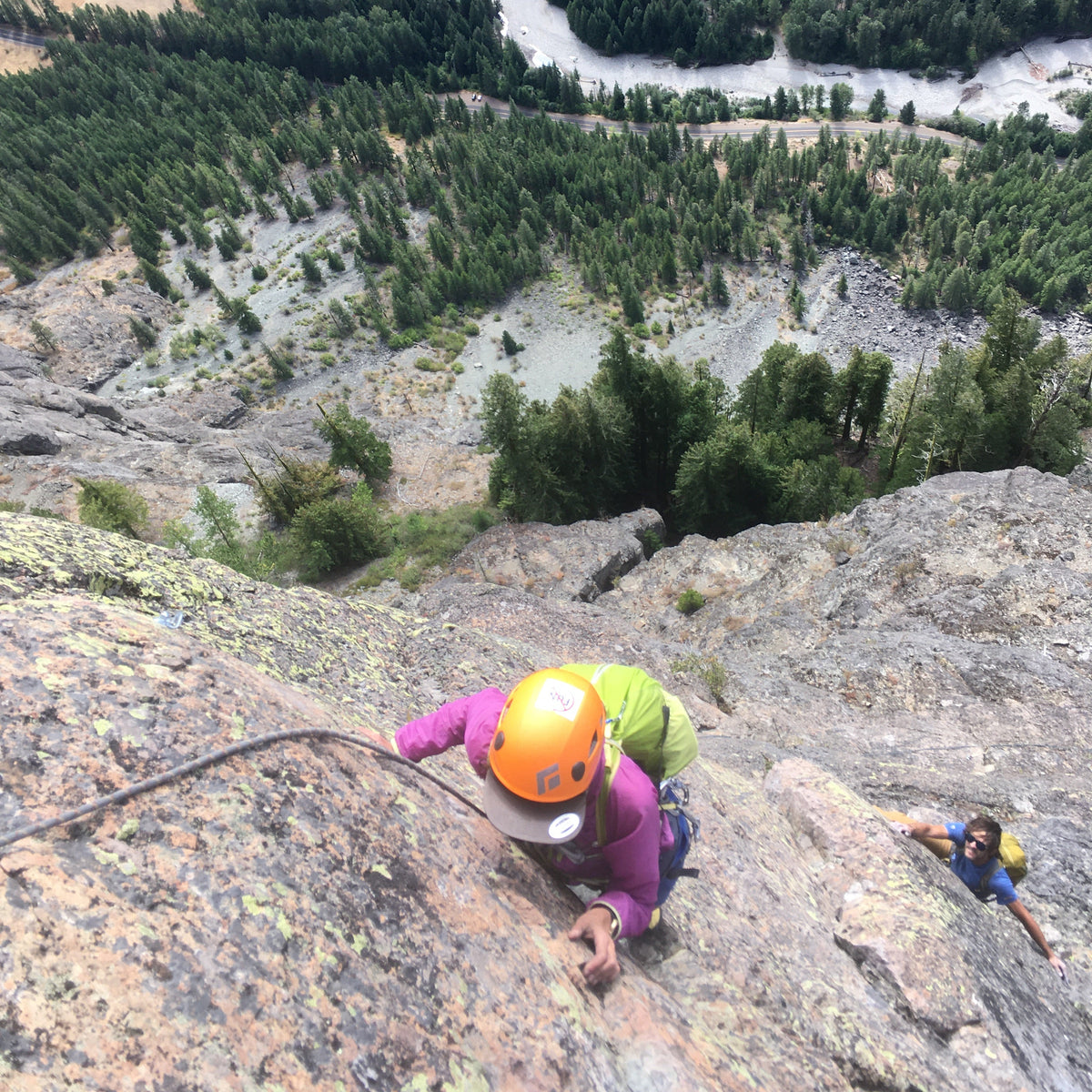 a rock climber high on fly boys, one of the nations best multipitch rock climbs in mazama washington