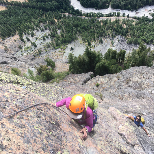 a rock climber high on fly boys, one of the nations best multipitch rock climbs in mazama washington