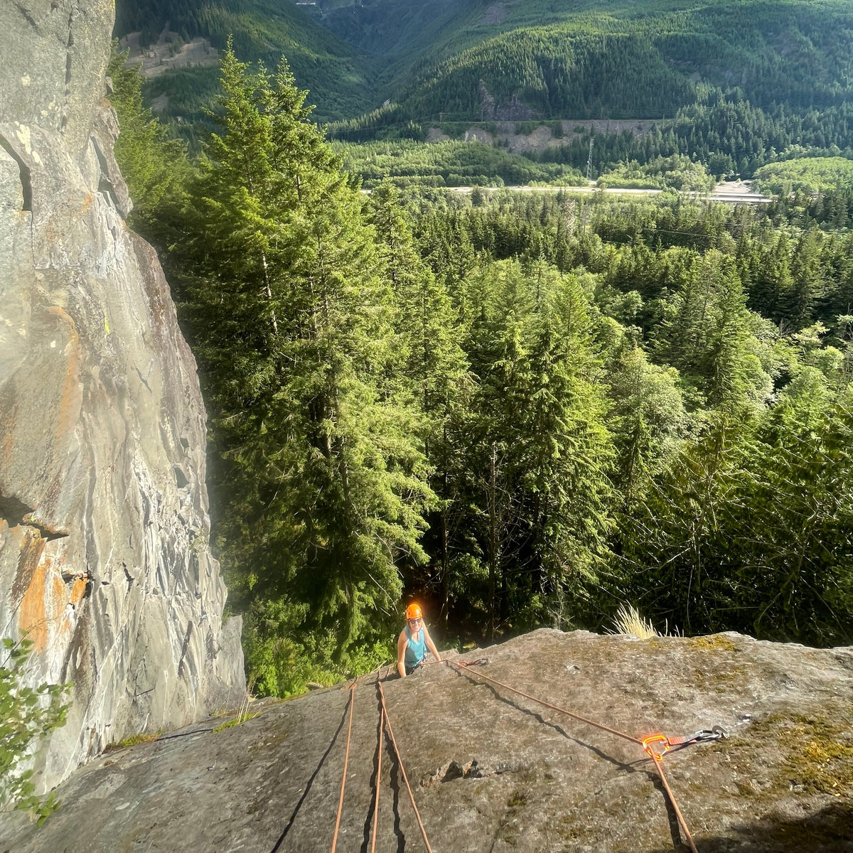 A nice view over the forest above I 90 snoqualmie pass rock climbing with an instructor on neverland crag at exit 38 Seattle wa