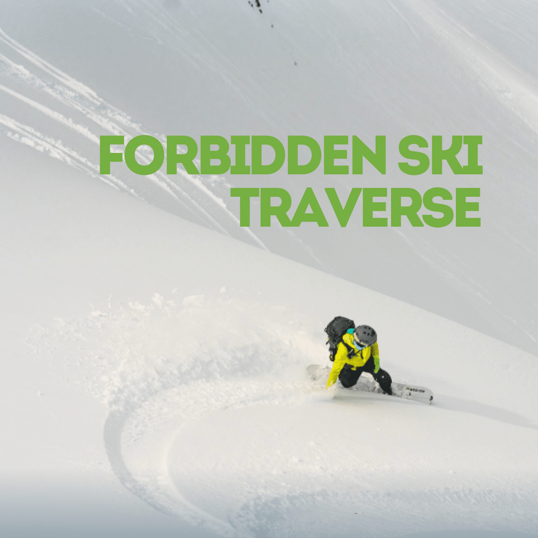 Person skiing down a snowy slope with Forbidden Ski Traverse