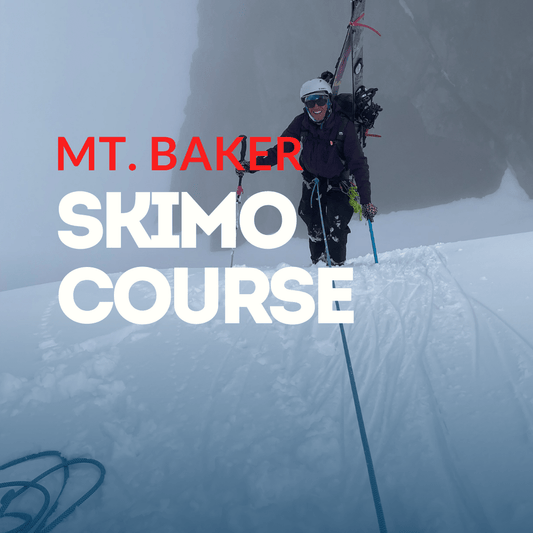 Person skiing in a snowy mountainous area Mt. Baker Skimo Course