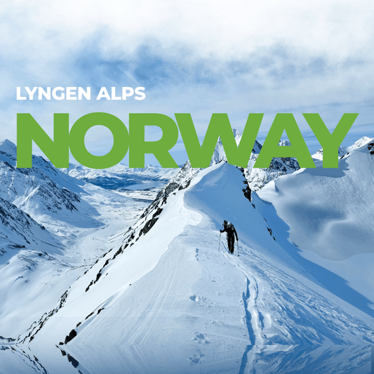 Person skiing up a snowy mountain in the Lyngen Alps Norway