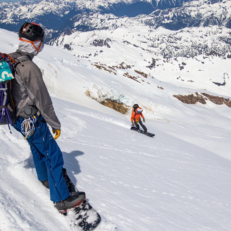 Riding down sherman peak on the talum glacier and the ne face of mount sherman above bakers crater overlooking the boulder glacier, the shuksan arm, with certified splitboard guides