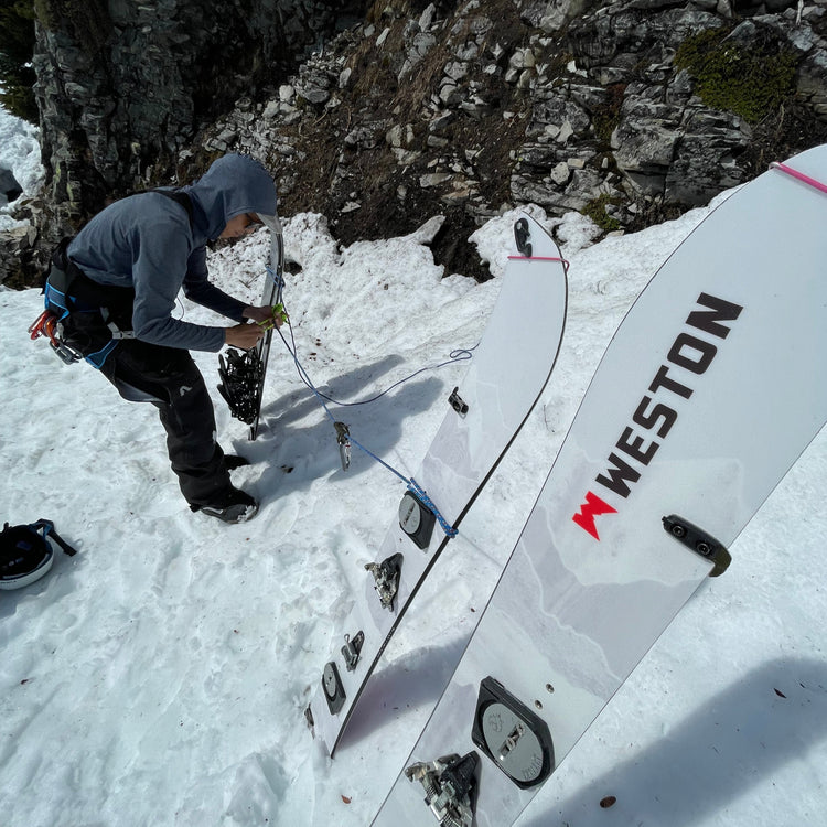 Splitboard anchors in the mt baker backcountry with a certified ski guide during a ski mountaineering course