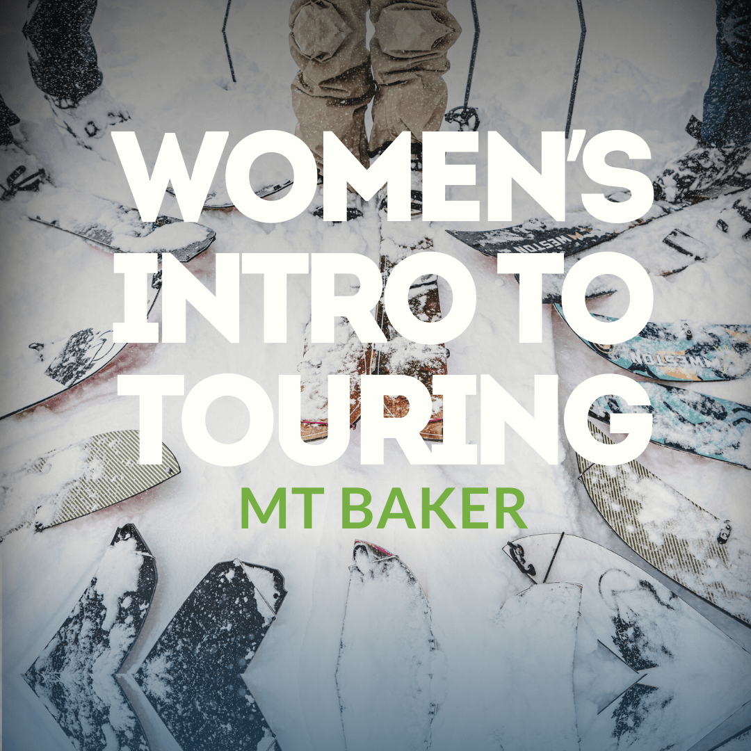 Woman skinning uphill while learning backcountry touring in the Mount Baker backcountry