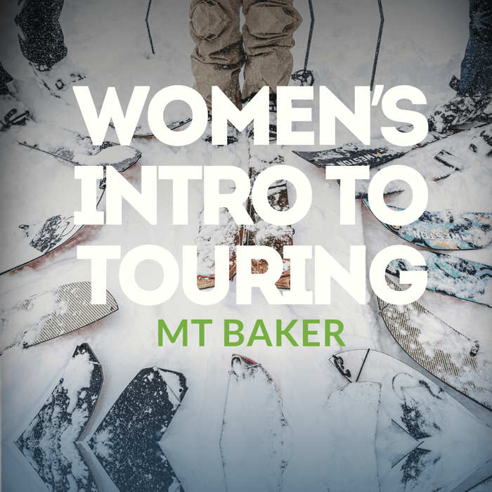 Woman skinning uphill while learning backcountry touring in the Mount Baker backcountry