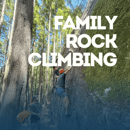 Two people rock climbing on a tree trunk with Family Rock Climbing