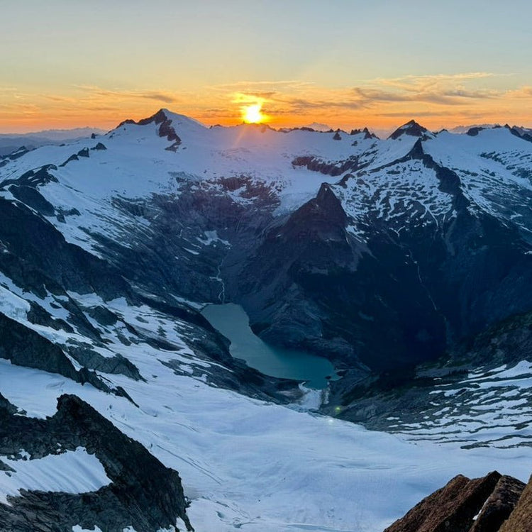Stnning sunset views from high bivy on th north ridge of forbidden peak overlooking Moraine Lake, the Inspiration Glacier, Eldorado Peak, Klawatti Peal