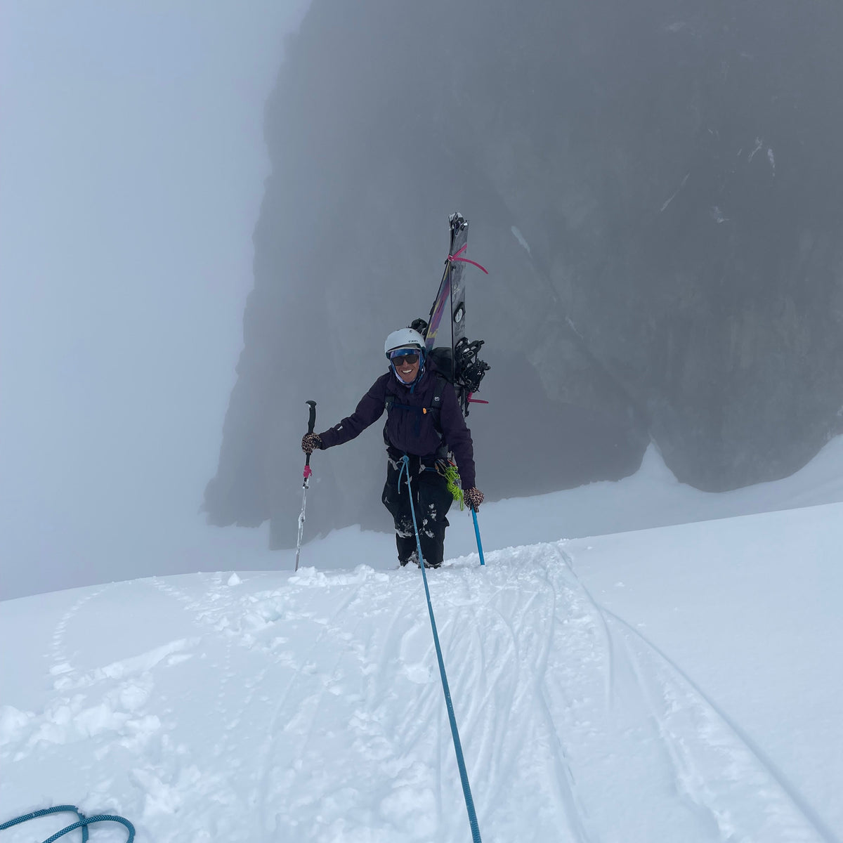 steep snow belay for a splitboard mountaineer on hells high way upper curtis glacier, sulphide glacier, mount shuksan white salmon glacier with the splitboard on their back