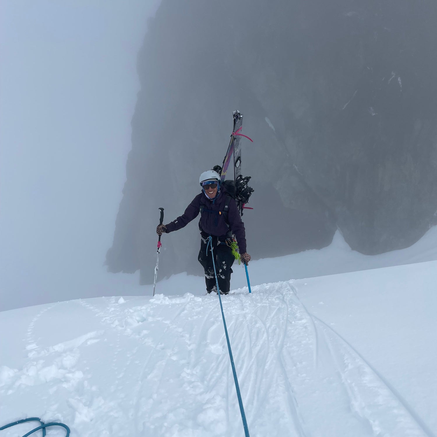 steep snow belay for a splitboard mountaineer on hells high way upper curtis glacier, sulphide glacier, mount shuksan white salmon glacier with the splitboard on their back
