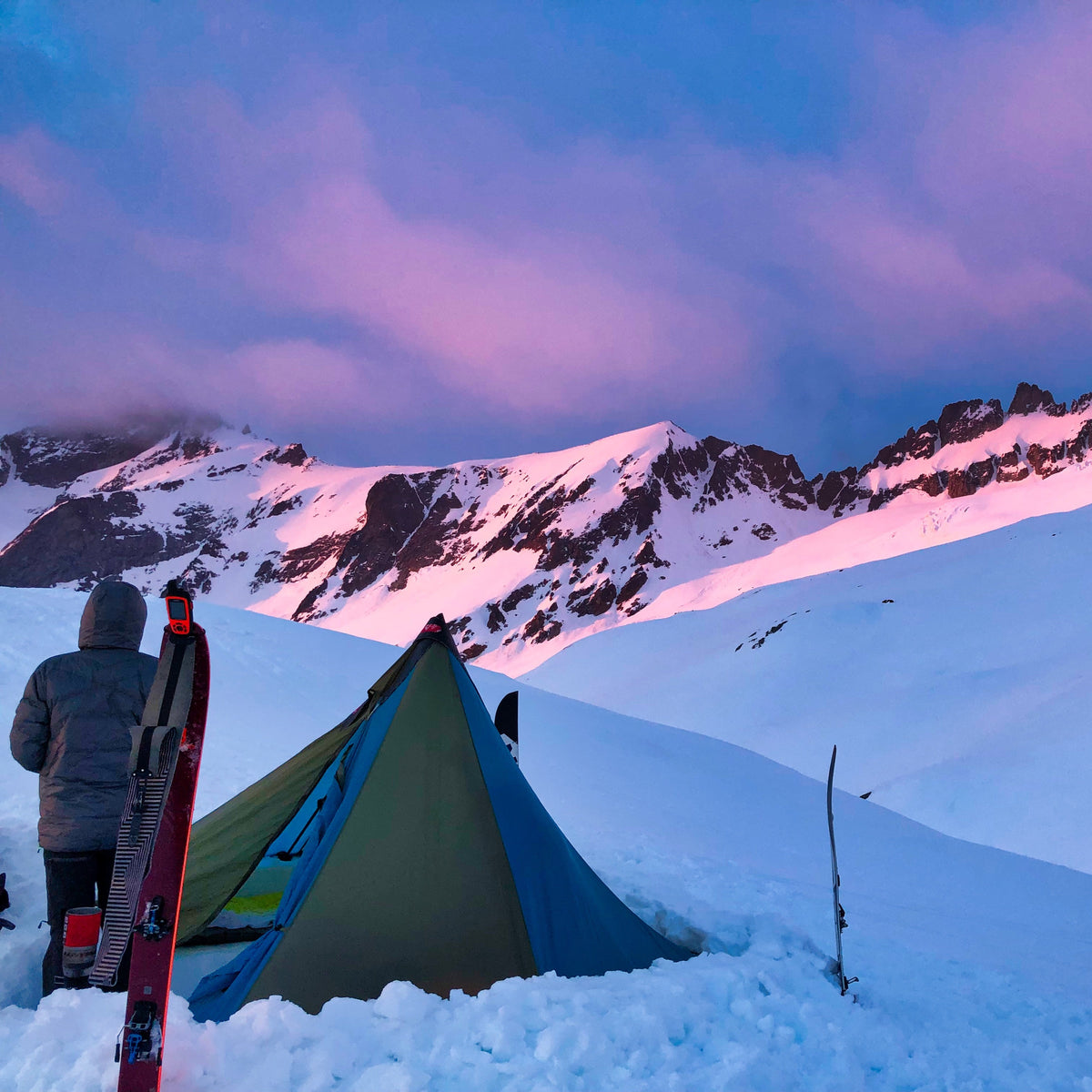 Setting up camp for the night on a glacal moraine below the Quien Sabe Glacier on Sahale mountain, appreciating the pink hughes of  the stunning alpenglow. during the forbidden tour