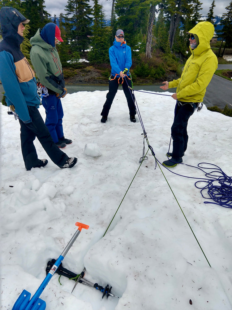 Lead Guide and Founder of Guided Exposure teaching students the basics of Crevasse Rescue. 