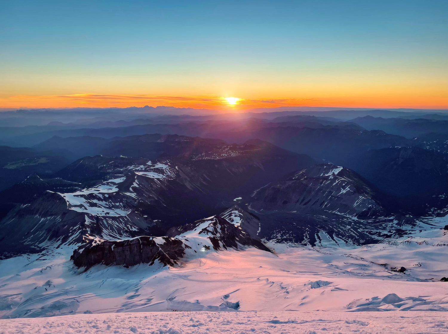 a classic stunning sunrise over the Emmons glacier on mount rainier
