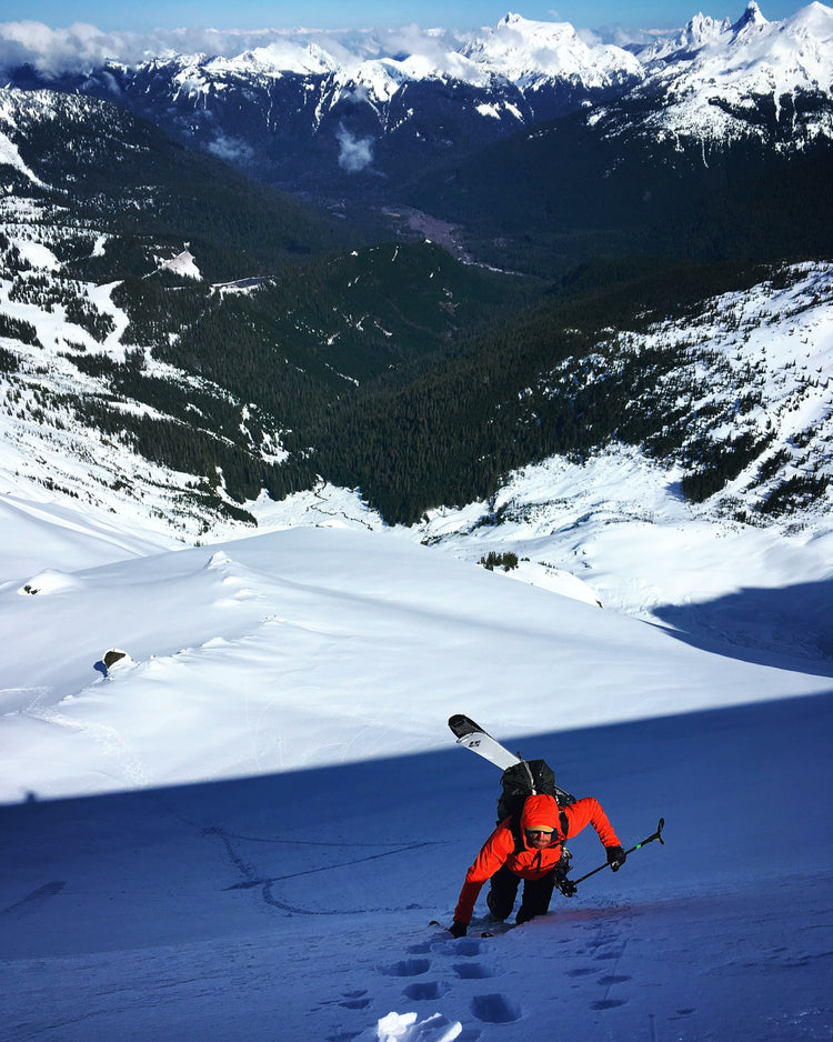 A skier working their way up the steeper section of the boot pack.