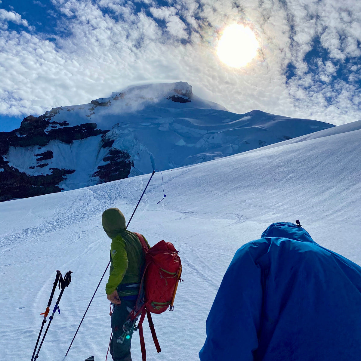 Lead splitboard guide prepares to probe a crevasse crossing during one of our guided ski ascents. 