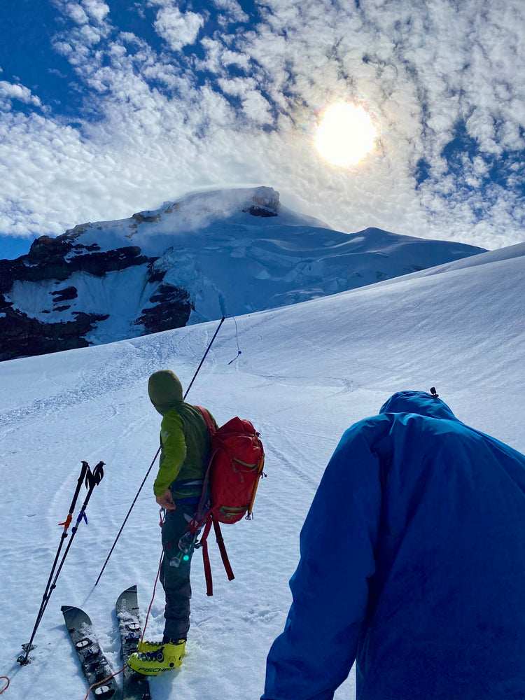 Lead splitboard guide prepares to probe a crevasse crossing during one of our guided ski ascents. 