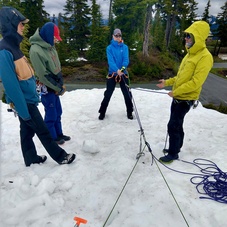 Learning crevasse rescue during a 4 day splitboard mountaineering seminar at mount baker
